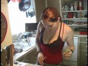 Redhead amateur gives blowjob and gets facial in kitchen