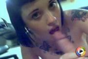 Sexy tattooed cam girl shows off her cock sucking skills on webcam